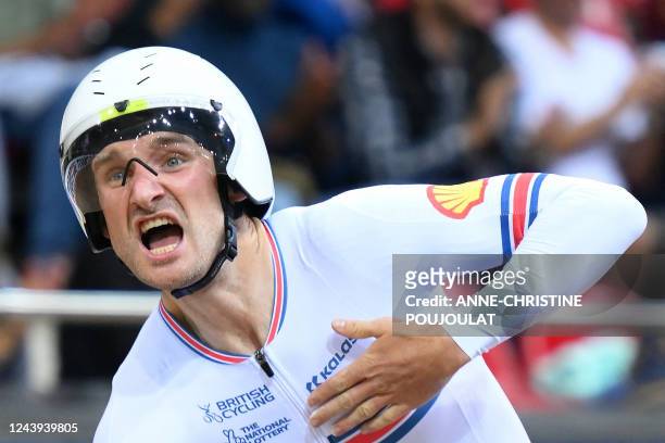 Great Britain's Daniel Bigham celebrates his team's victory after winning the Men's Team Pursuit finals during the UCI Track Cycling World...