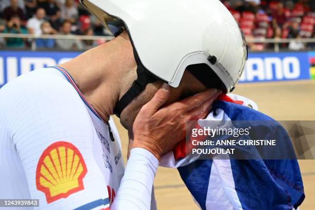 Great Britain's Daniel Bigham reacts after his team's victory in the Men's Team Pursuit finals during the UCI Track Cycling World Championships at...