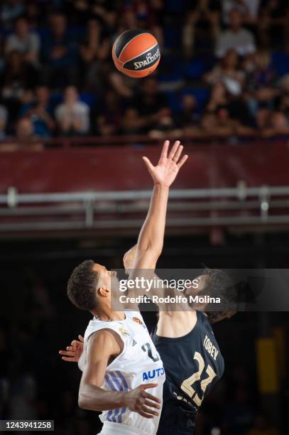 Petr Cornelie, #21 of Real Madrid competes with Mike Tobey, #23 of FC Barcelona during the 2022/2023 Turkish Airlines EuroLeague Regular Season Round...