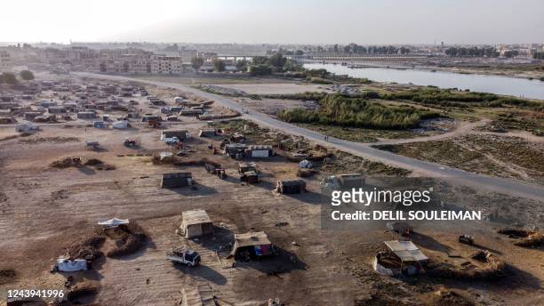 This picture taken on October 13, 2022 shows an aerial view of the "Yunani" camp for Syrians displaced by conflict originally from the countryside of...