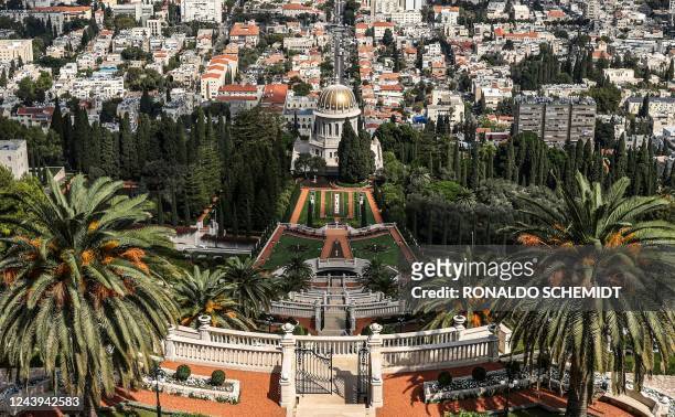This picture taken on October 12, 2022 from atop Mount Carmel shows a view of the Shrine of Bab at the Bahai Terraces, or the Hanging Gardens of...