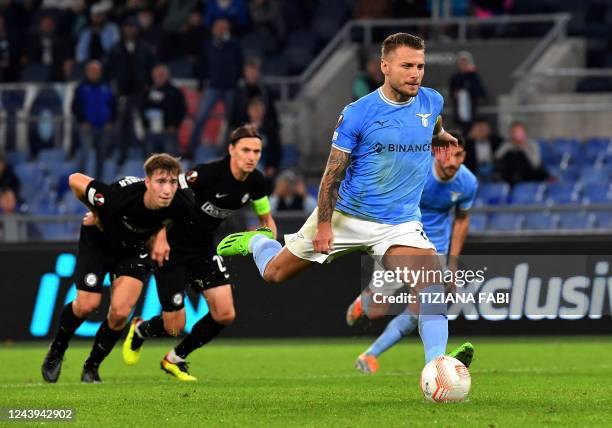 Lazio's Italian forward Ciro Immobile takes and scores a penalty during the Europa League first round day 4 Group F football match between Lazio and...