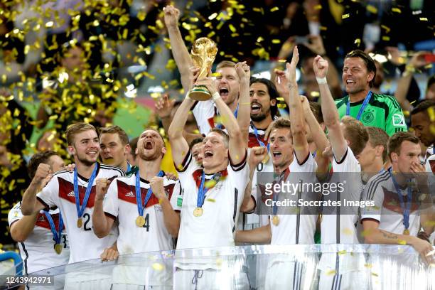 Players of germany celebrating with the World Cup Trophy Christoph Kramer of Germany, Benedikt Howedes of Germany, Bastian Schweinsteiger of Germany,...
