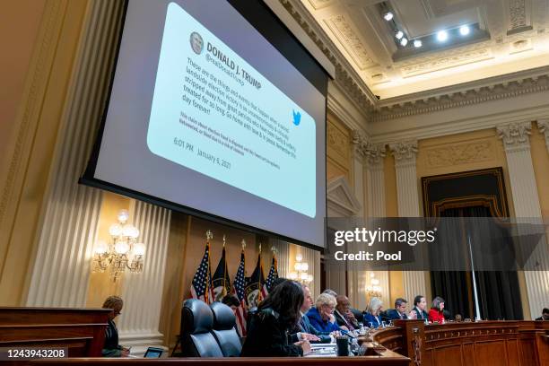 Tweet from former President Donald Trump sent on Jan. 6 is displayed during a House select committee hearing investigating the Jan. 6 attack on the...