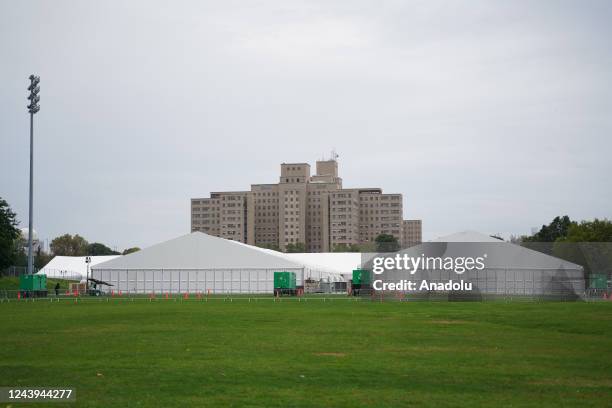 The Randall's Island tents are expected to provide temporary shelter for 500 adults as the cityâs homeless population has increased with the arrival...