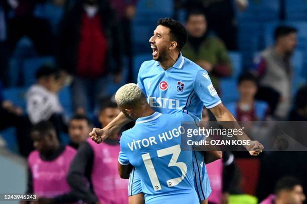 Trabzonspor's Egyptian midfielder Trézéguet celebrates scoring his team's fourth goal during the Europa League Group H football match between...