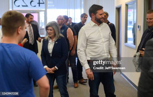 Republican Senate candidate for Ohio JD Vance and US Senator Jodi Ernst greet supporters at a campaign office on October 13, 2022 in Canton, Ohio....