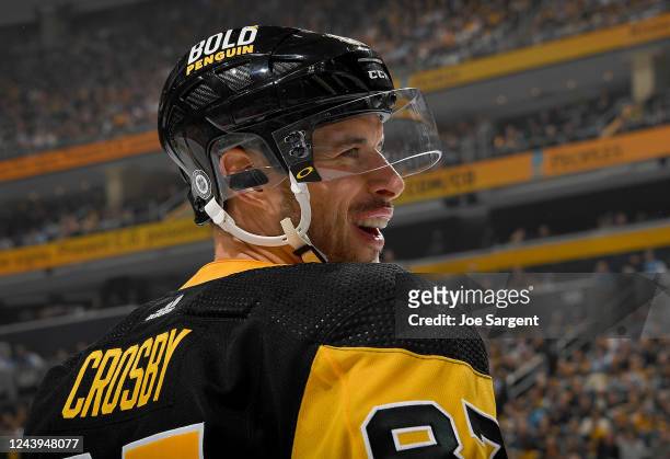 Sidney Crosby of the Pittsburgh Penguins looks on against the Arizona Coyotes during the game at PPG PAINTS Arena on October 13, 2022 in Pittsburgh,...