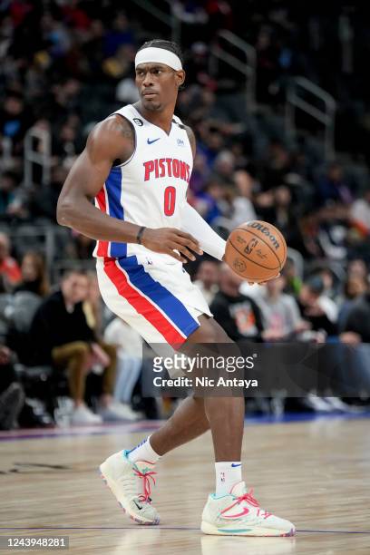 Jalen Duren of the Detroit Pistons handles the ball against the Memphis Grizzlies during the first quarter at Little Caesars Arena on October 13,...