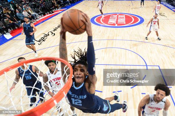 Ja Morant of the Memphis Grizzlies drives to the basket during the game against the Detroit Pistons on October 13, 2022 at Little Caesars Arena in...