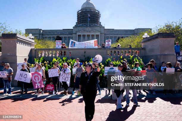 Counter-protestors gather in front of a rally encouraging voters to vote yes on Amendment 2, which would add a permanent abortion ban to Kentuckys...