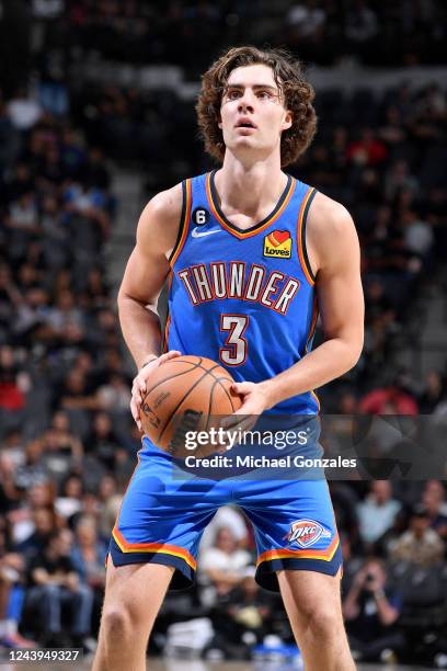 Josh Giddey of the Oklahoma City Thunder /shoots a free throw against the San Antonio Spurs during a preseason game on October 13, 2022 at the AT&T...