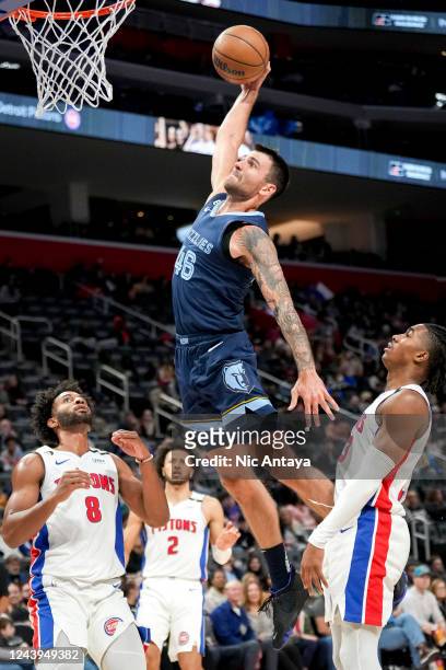 John Konchar of the Memphis Grizzlies goes to dunk the ball against the Detroit Pistons during the fourth quarter at Little Caesars Arena on October...