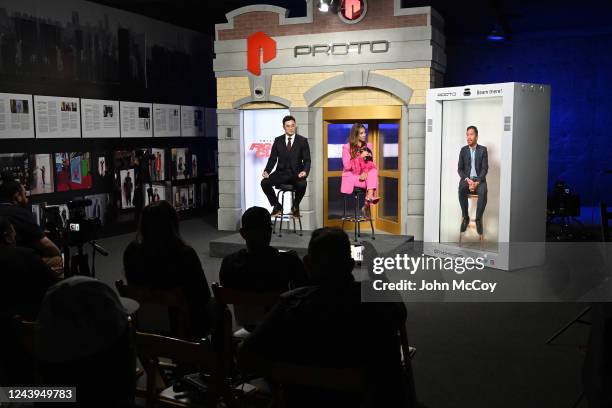 Host Cynthia Conte interviews Manny Pacquiao, who appeared in a hologram, during a press conference with DK Yoo on October 13, 2022 in Van Nuys,...