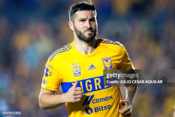 Tigres' French forward Andre Pierre Gignac celebrates after scoring against Pachuca during their Mexican Apertura tournament football match between...