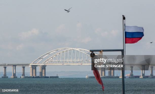 View taken on October 14, 2022 shows the Kerch Bridge that links Crimea to Russia, near Kerch, which was hit by a blast on October 8, 2022. - The...