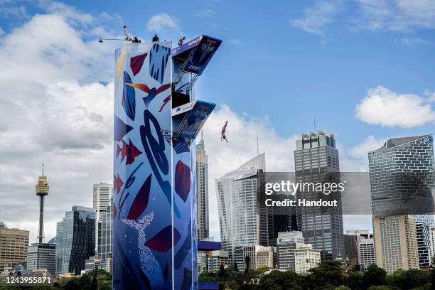 In this handout image provided by Red Bull, Meili Carpenter of the USA dives from the 21 metre platform during the first competition day of the...