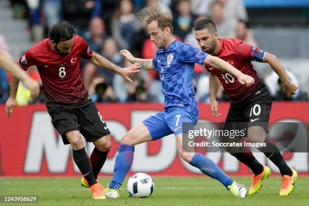 SelCuk Inan of Turkey, Ivan Rakitic of Croatia, Arda Turan of Turkey during the EURO match between Turkey v Croatia on June 12, 2016