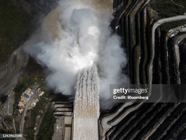 Water flows out of the Hidroituango hydroelectric dam in Ituango, Colombia, on Thursday, Oct. 13, 2022. Repairs are almost complete at Hidroituango...