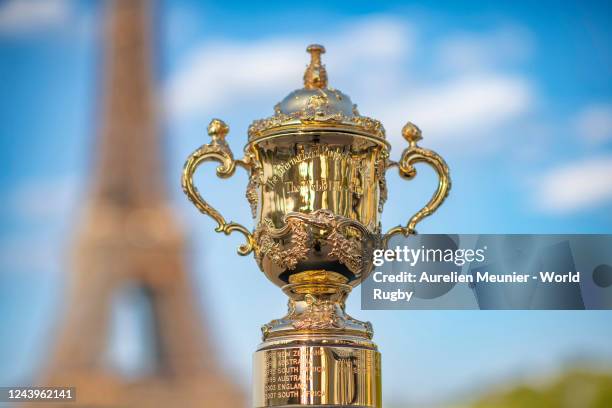 The Webb Ellis Cup is photographed at the Eiffel Tower to mark One Year until Rugby World Cup France 2023 on August 31, 2022 in Paris, France.