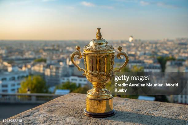 The Webb Ellis Cup is photographed overlooking the city to mark One Year until Rugby World Cup France 2023 on August 31, 2022 in Paris, France.