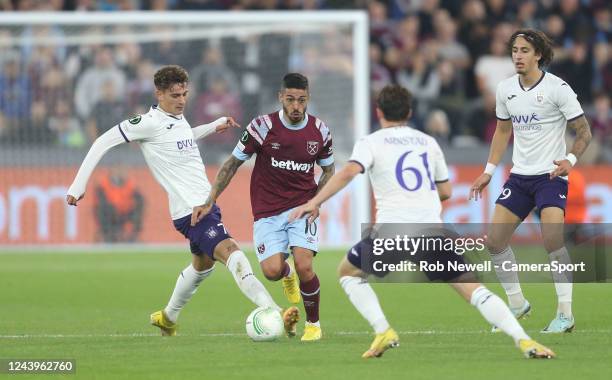 West Ham United's Manuel Lanzini takes on Anderlecht's Sebastiano Esposito and Kristian Arnstad during the UEFA Europa Conference League group B...