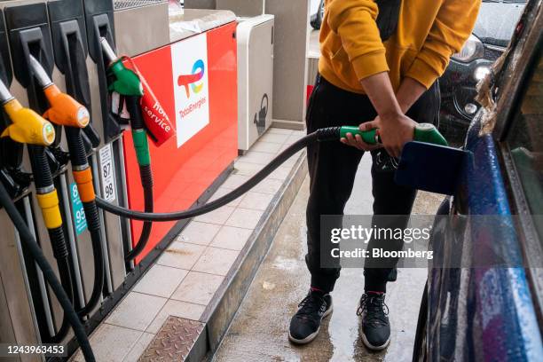 Customer refuels his vehicle at TotalEnergies gas station in Paris, France, on Friday, Oct. 14, 2022. TotalEnergies called for all strikes to end as...