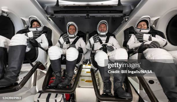 In this handout provided by NASA, NASA astronauts Jessica Watkins, Robert Hines, Kjell Lindgren, and ESA astronaut Samantha Cristoforetti are seen...
