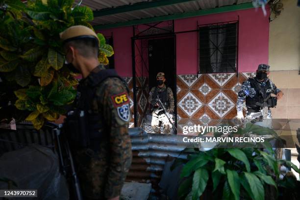 Police and soldiers check house by house to capture gang members, in Soyapango, El Salvador, on October 6, 2022. - Police in El Salvador have...