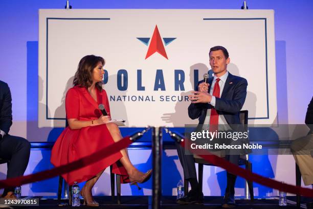 Polaris National Security Founder Morgan Ortagus listens as Republican candidate for U.S. Senate Blake Masters speaks during the America the Great...