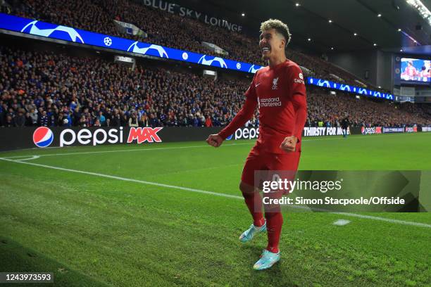 Roberto Firmino of Liverpool celebrates after scoring their 2nd goal during the UEFA Champions League group A match between Rangers FC and Liverpool...