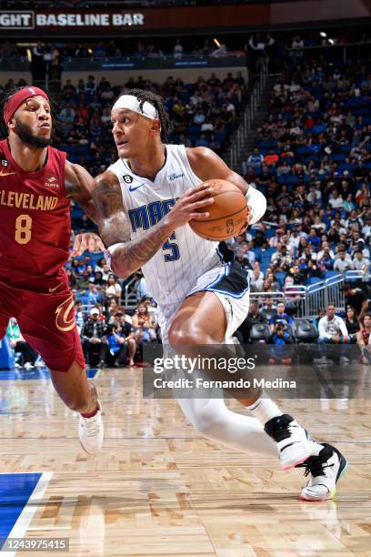 Paolo Banchero of the Orlando Magic drives to the basket against the Cleveland Cavaliers during a preseason game on October 14, 2022 at Amway Center...