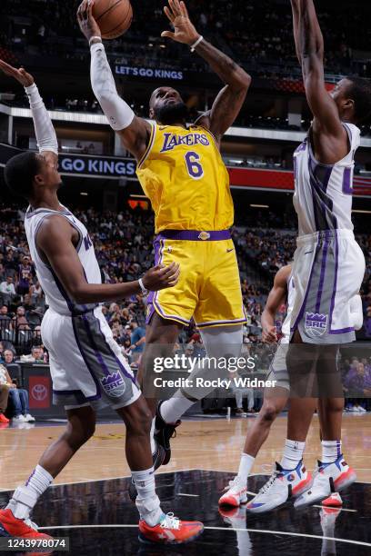 LeBron James of the Los Angeles Lakers shoots the ball during the game against the Sacramento Kings on October 14, 2022 at Golden 1 Center in...