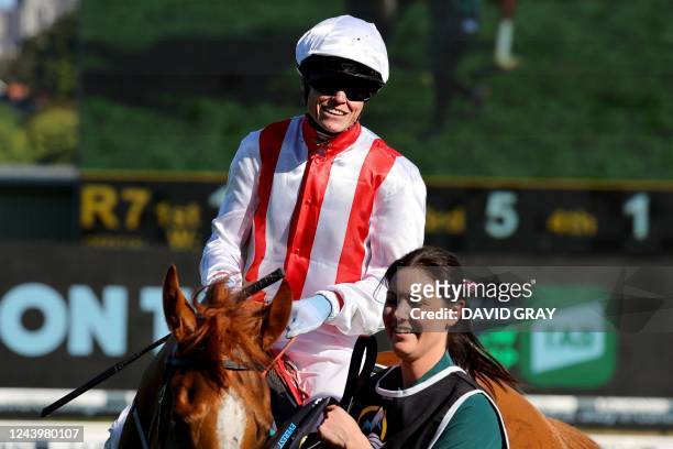 Jockey Craig Williams reacts after riding the wining horse Giga Kick during the Everest 2022 horse race at the Royal Randwick race course in Sydney...