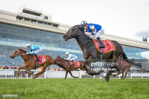 Durston ridden by Michael Dee wins the Carlton Draught Caulfield Cup at Caulfield Racecourse on October 15, 2022 in Caulfield, Australia.