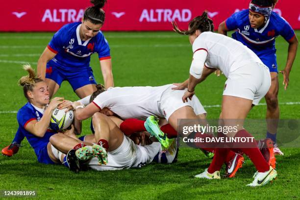 France's Chloe Jacquet is tackled during the New Zealand 2021 Women's Rugby World Cup Pool C match between France and England at Northland Events...