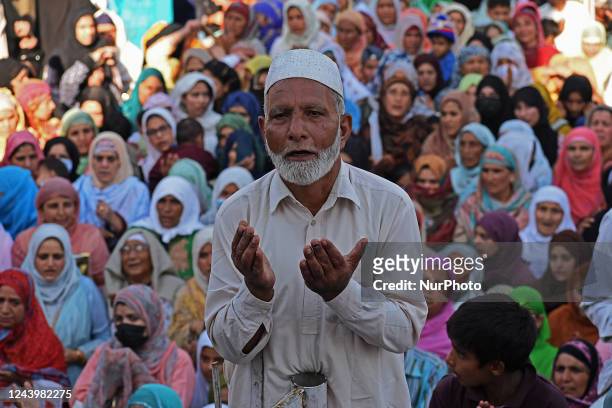 Kashmiri muslim man prays as the head cleric displays the holy relic beleived to be a hair from the beard of Prophet Muhammad on the occasion of...