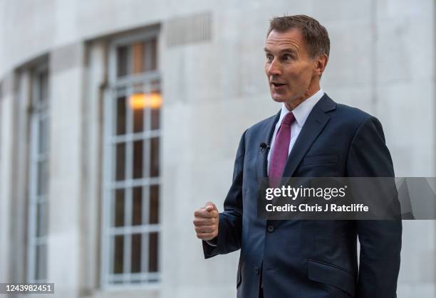 Chancellor of the Exchequer, Jeremy Hunt, takes part in a TV interview outside BBC Broadcasting House on October 15, 2022 in London, England. Former...