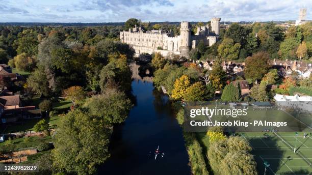 Rowers approach Warwick Castle as they travel along the river Avon. Picture date: Saturday October 15, 2022.