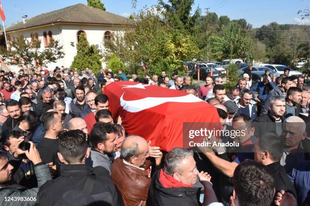 Family members and relatives mourn during a funeral for mine worker Berkay Pinaroglu who lost his life in blast at coal mine in northern Turkiye's...
