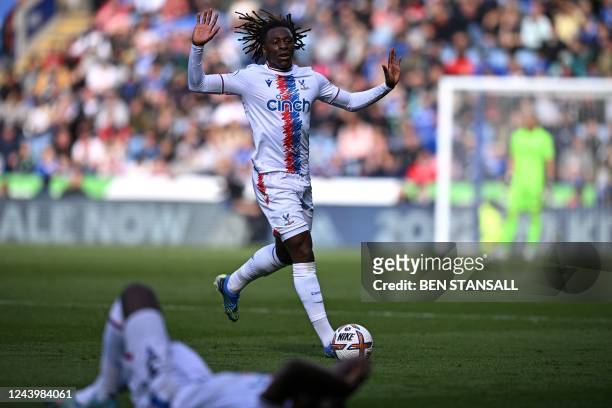 Crystal Palace's English midfielder Eberechi Eze gestures to stop the game during the English Premier League football match between Leicester City...