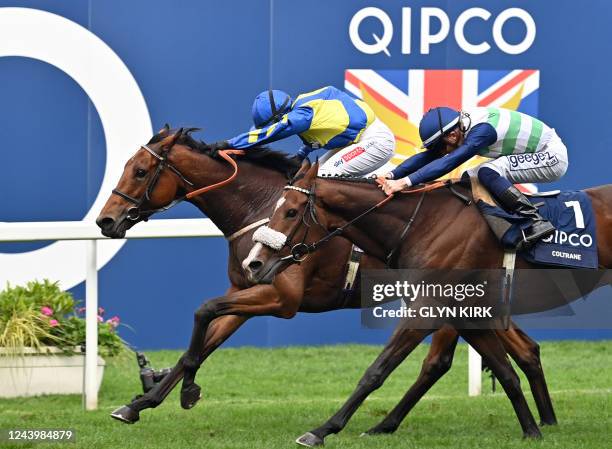 Jockey Hollie Doyle rides Trueshan to victory over jockey David Probert on Coltrane in the Long Distance Cup on Qipco British Champions Day at Ascot...