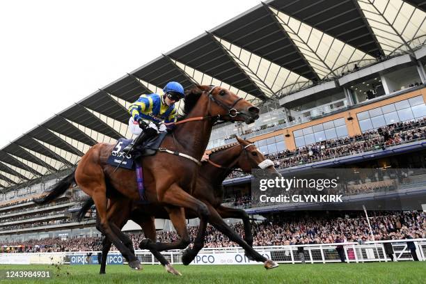 Jockey Hollie Doyle rides Trueshan to victory over jockey David Probert on Coltrane in the Long Distance Cup on Qipco British Champions Day at Ascot...