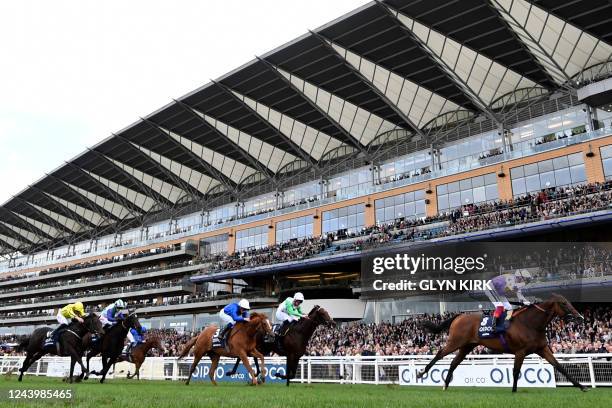 Italian jockey Frankie Dettori on Kinross wins the British Champions Sprint Stakes on Qipco British Champions Day at Ascot Racecourse, west of London...