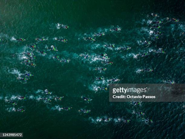 Athletes during the swim leg of IRONMAN 70.3 Portugal Cascais on October 15, 2022 in Lisbon, Portugal.