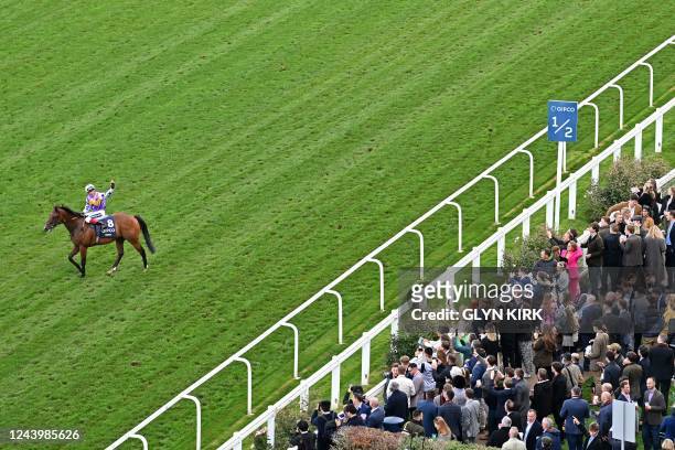 Italian jockey Frankie Dettori reacts in front of the grandstand on Kinross after victory in the British Champions Sprint Stakes on Qipco British...