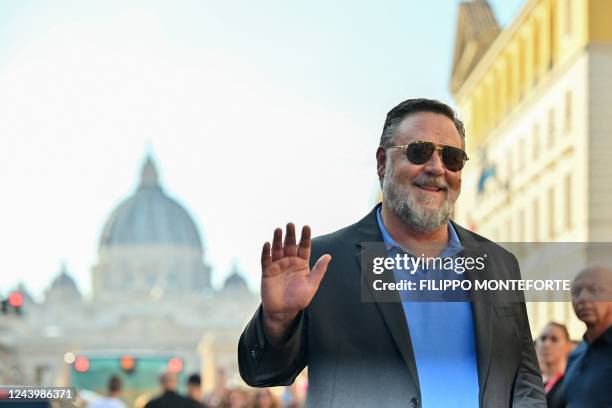 New Zealand actor and director Russell Crowe gestures as he arrives for a masterclass on October 15, 2022 at the Auditorium Via dela Conciliazione in...