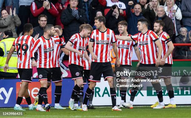 Sheffield United's James McAtee celebrates with his team mates after scoring during the Sky Bet Championship between Sheffield United and Blackpool...