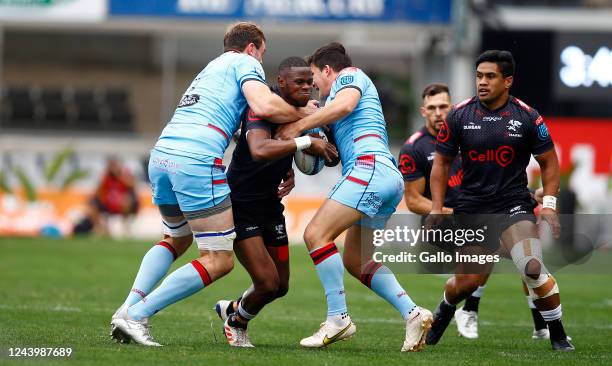 Richie Gray of Glasgow Warriors tackling Aphelele Fassi of the Cell C Sharks during the United Rugby Championship match between Cell C Sharks and...