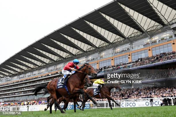 British jockey Richard Kingscote rides Bay Bridge to victory in the Champion Stakes on Qipco British Champions Day at Ascot Racecourse, west of...